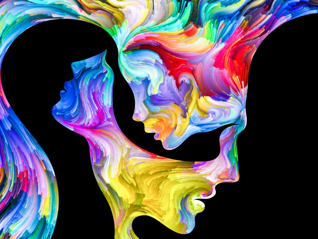 Interplay of Human profiles and swirls of colorful paint on the subject of emotion, passion, desire, feelings, inner world, imagination and creativity